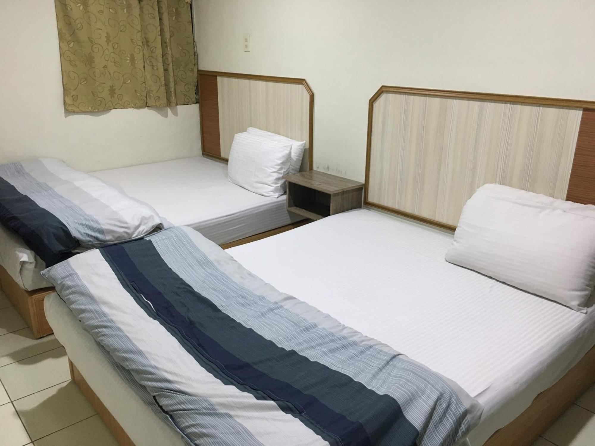 Yongxing Inn Kota Chiayi Bagian luar foto