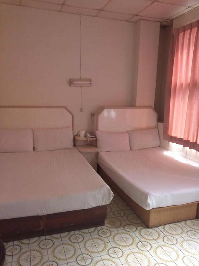 Yongxing Inn Kota Chiayi Bagian luar foto